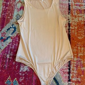 Large nude body suit